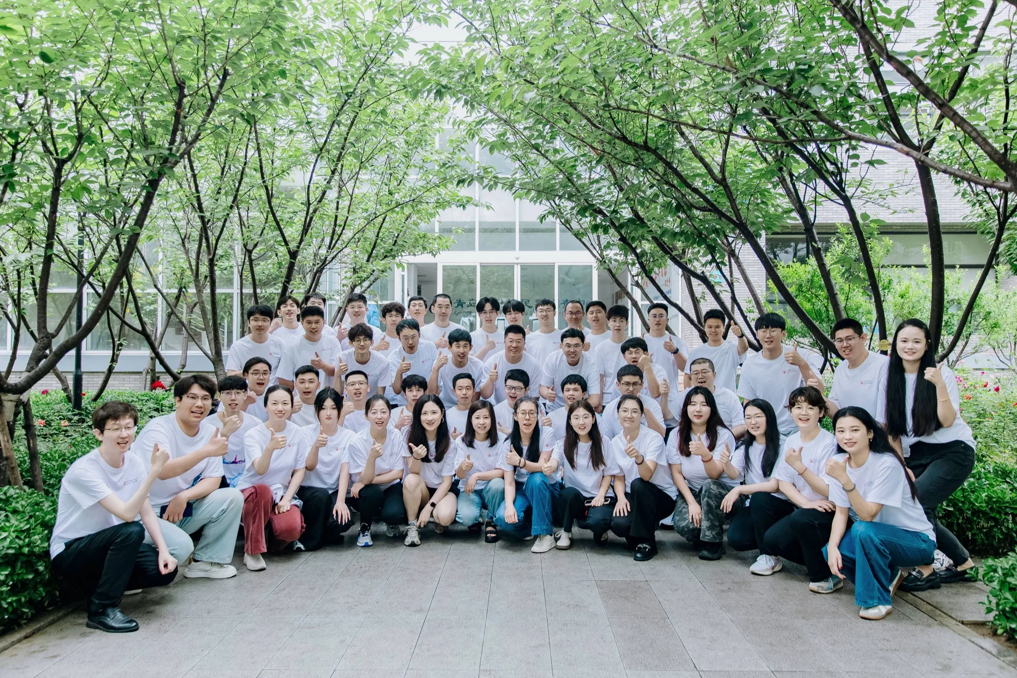 Shinetech Qingdao team together in the office garden