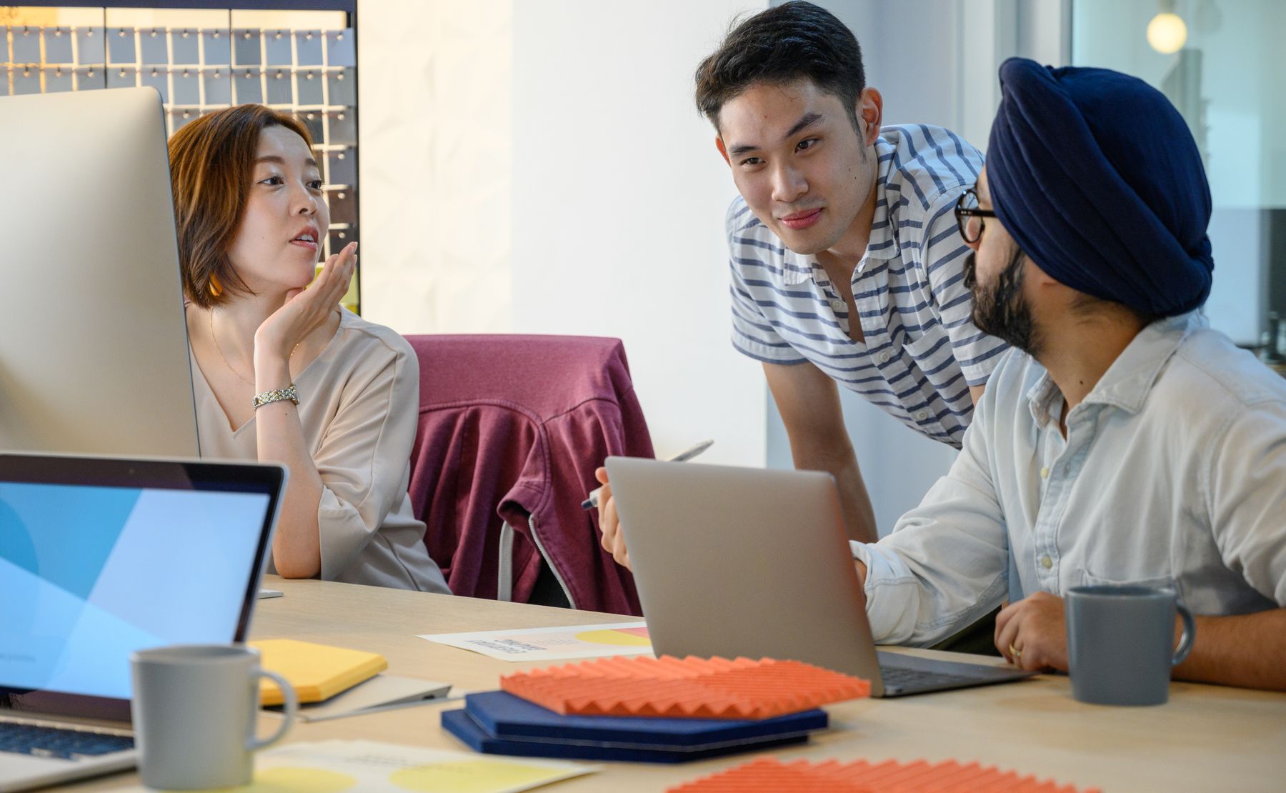 Software team reviewing workforce platform requirements together